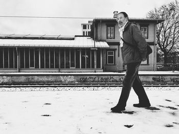 Full length of woman standing in city