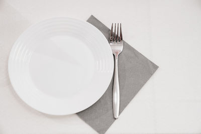 Close-up of empty plate on table