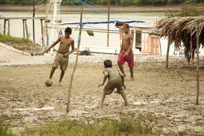 Group of people running on ground