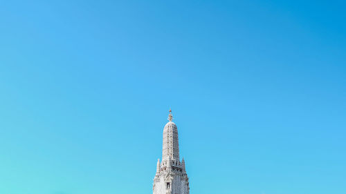 Low angle view of building against blue sky