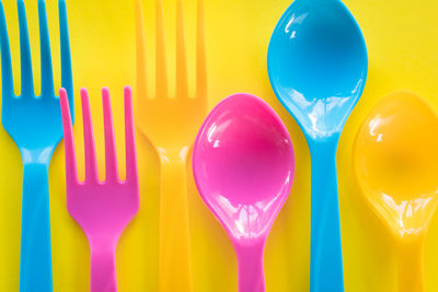 Close-up of colorful cutlery