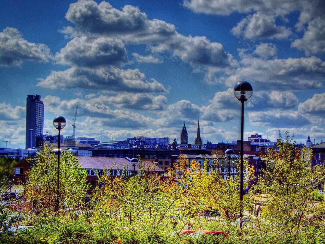 sky, architecture, building exterior, built structure, cloud - sky, city, cloud, cloudy, cityscape, tree, growth, street light, blue, water, plant, tower, river, modern, skyscraper, outdoors