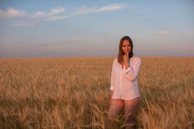 Seductive woman standing infield