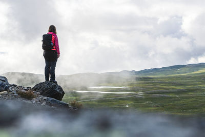 Hiker looking at view