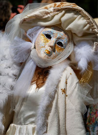 Close-up of mask on white wall