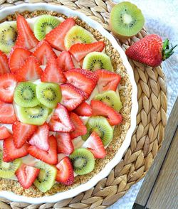 Directly above shot of strawberry kiwi cream cheese tart