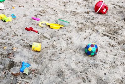 High angle view of toys at beach