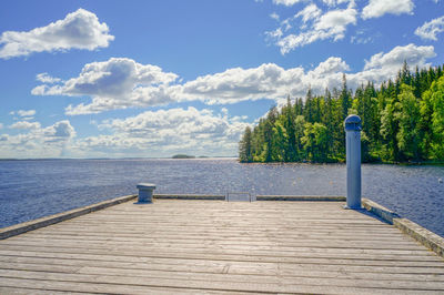 Pier over sea against sky