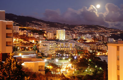 High angle view of illuminated city at night