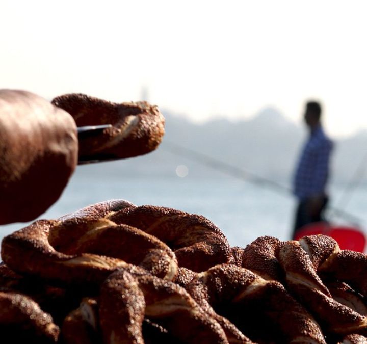 water, clear sky, focus on foreground, sky, rope, close-up, rock - object, metal, sea, outdoors, fishing, day, holding, copy space, nature, protection, part of, stack