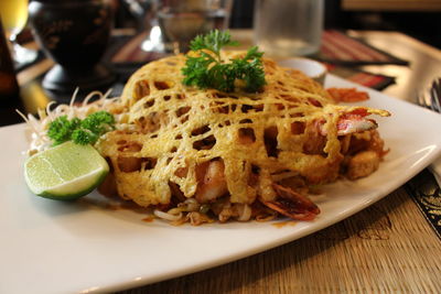 Close-up of food served in plate on table