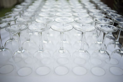 High angle view of wineglasses arranged on table