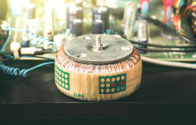 Close-up of illuminated lighting equipment on table