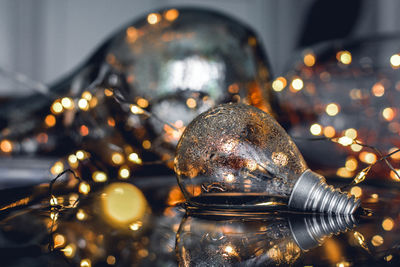 Close-up of illuminated light bulb