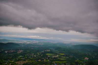 High angle view of buildings in city against sky