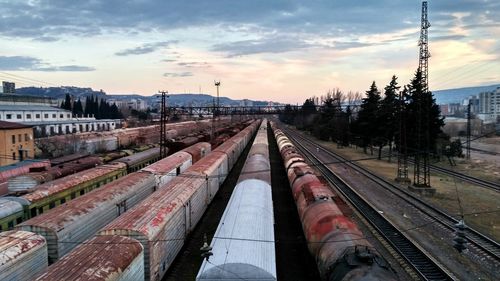 Train on railroad tracks against sky