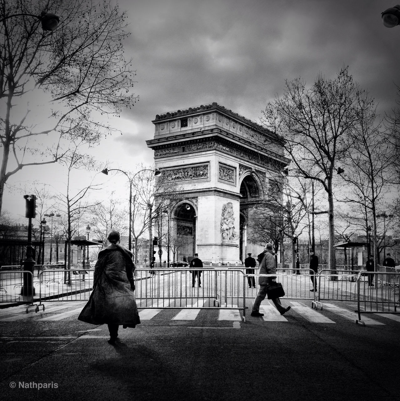 architecture, building exterior, built structure, sky, tree, men, city, person, cloud - sky, walking, lifestyles, street, incidental people, city life, leisure activity, bare tree, travel destinations, rear view