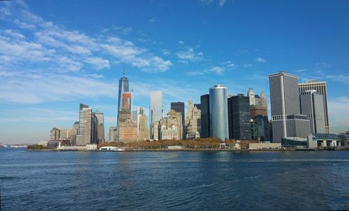 City skyline against blue sky