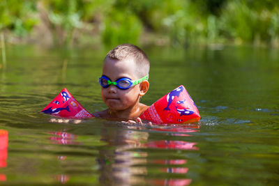 Portrait of boy in water