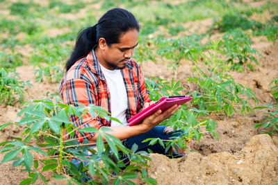 Young man using mobile phone