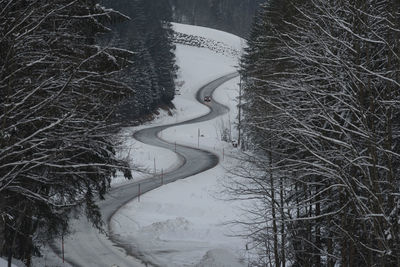 A snowy road in winter, traffic and mobility in winter season