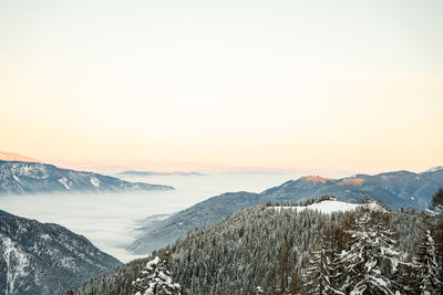 Scenic view of mountains against sky during sunset