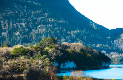 Scenic view of river and mountains