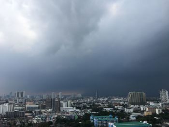 High angle view of buildings in city against sky