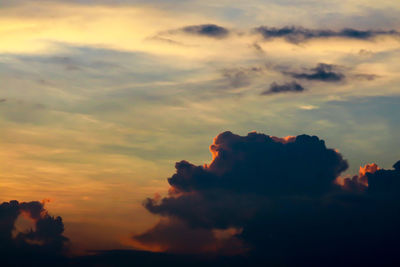 Low angle view of dramatic sky during sunset