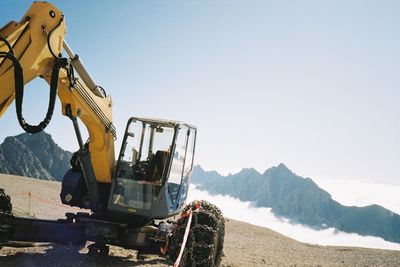 Panoramic view of construction site against clear sky