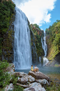 Scenic view of waterfall in forest