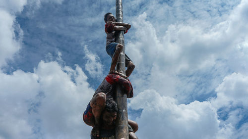 Low angle view of statue against sky
