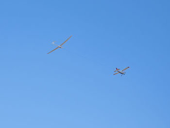 Glider plane flying during a takeoff