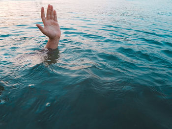 Person swimming in sea