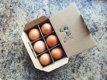 High angle view of eggs in box