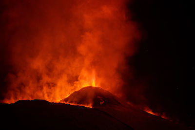 Scenic view of volcanic mountain during night