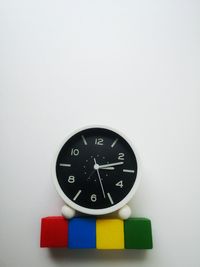 Close-up of clock against white background