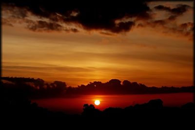 Silhouette of mountain at sunset