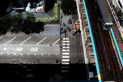 People walking on road in city