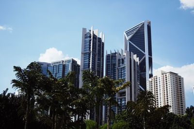 Low angle view of modern buildings against sky