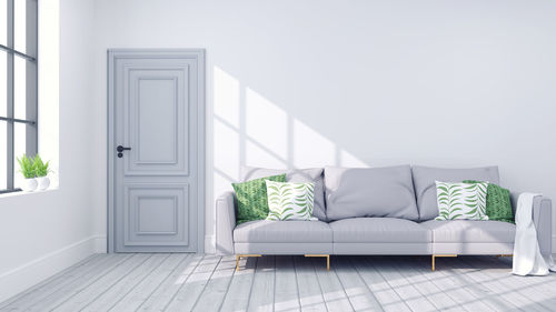 Modern scandinavian of living room interior concept, gray sofa with light gray wall on wood floor