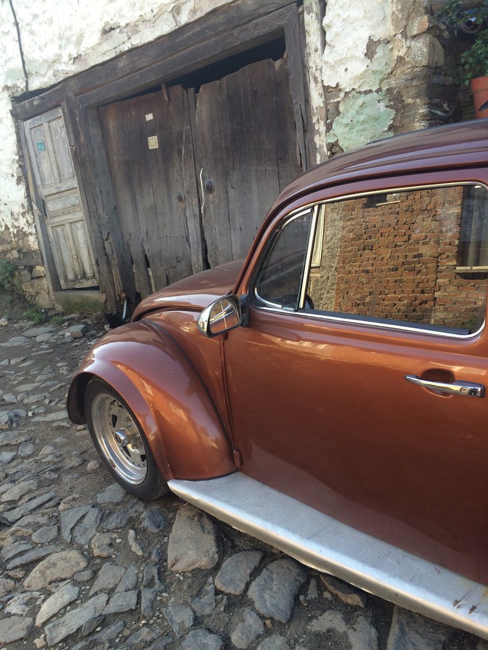 building exterior, architecture, built structure, transportation, mode of transport, land vehicle, car, abandoned, old, damaged, obsolete, window, house, street, outdoors, weathered, day, run-down, stationary, old-fashioned