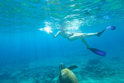 Man swimming in sea