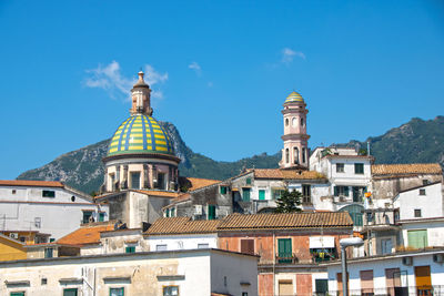 High angle view of buildings in city against sky