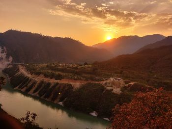 Scenic view of mountains against sky during sunset