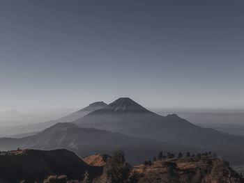 Scenic view of mountains against clear sky