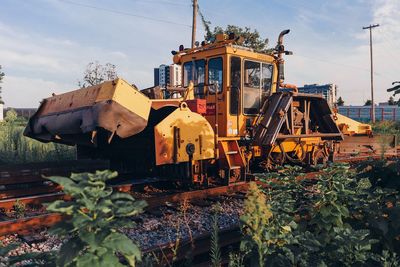 Construction machinery on railroad tracks