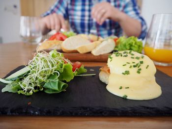 Close-up of man preparing food