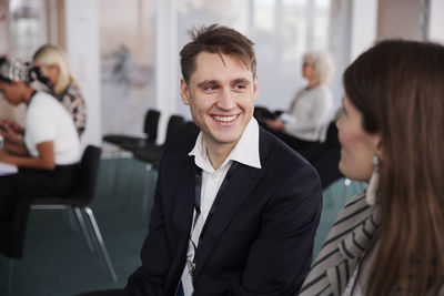 Smiling businessman during meeting
