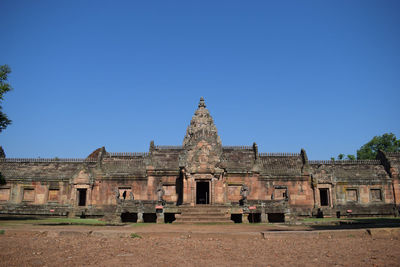 View of historic building against clear blue sky